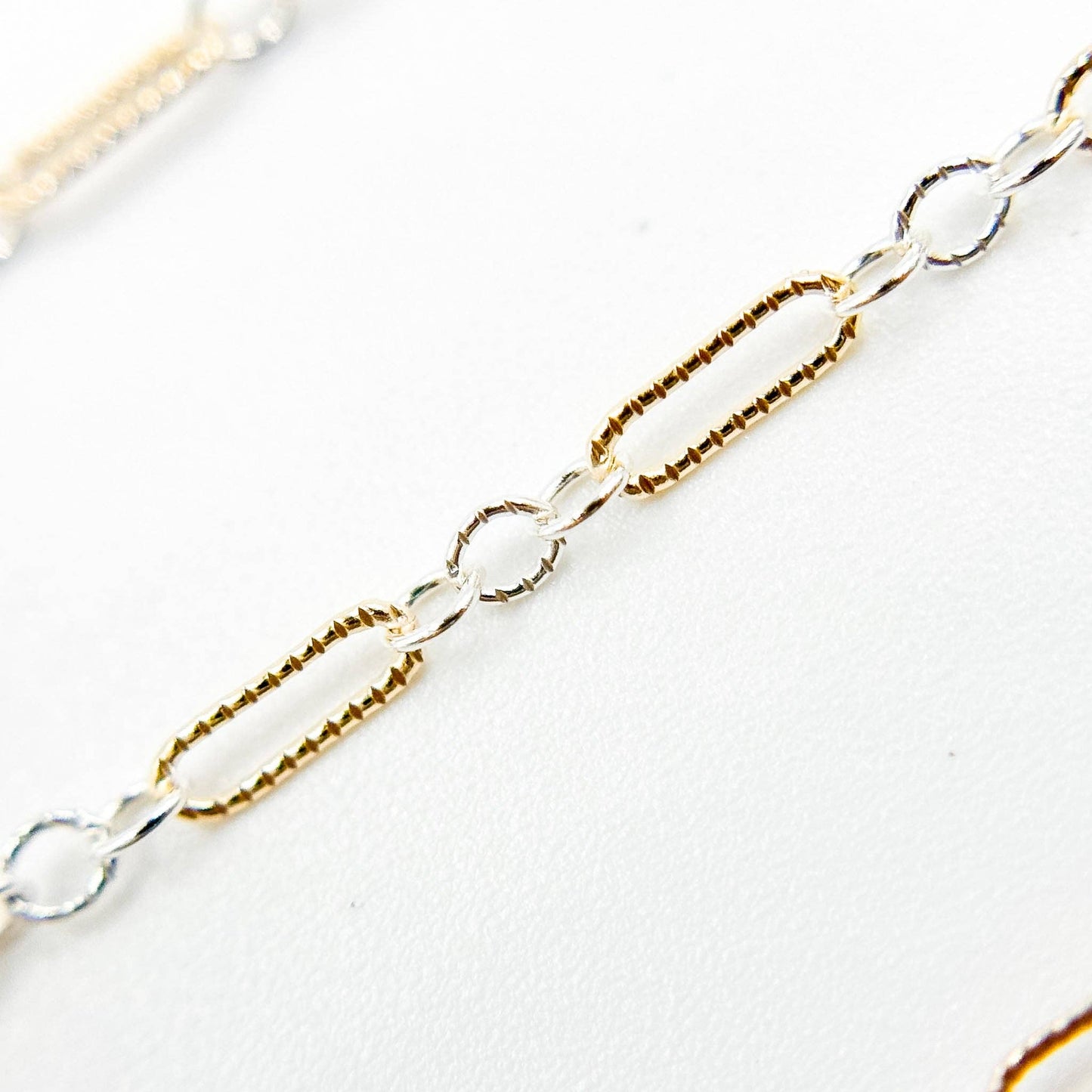 XM/1003K. 14K Gold Filled and Sterling Silver Knurled Link Chain – Long & Short Pattern