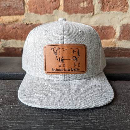 Raised in A Barn Youth Trucker Hat